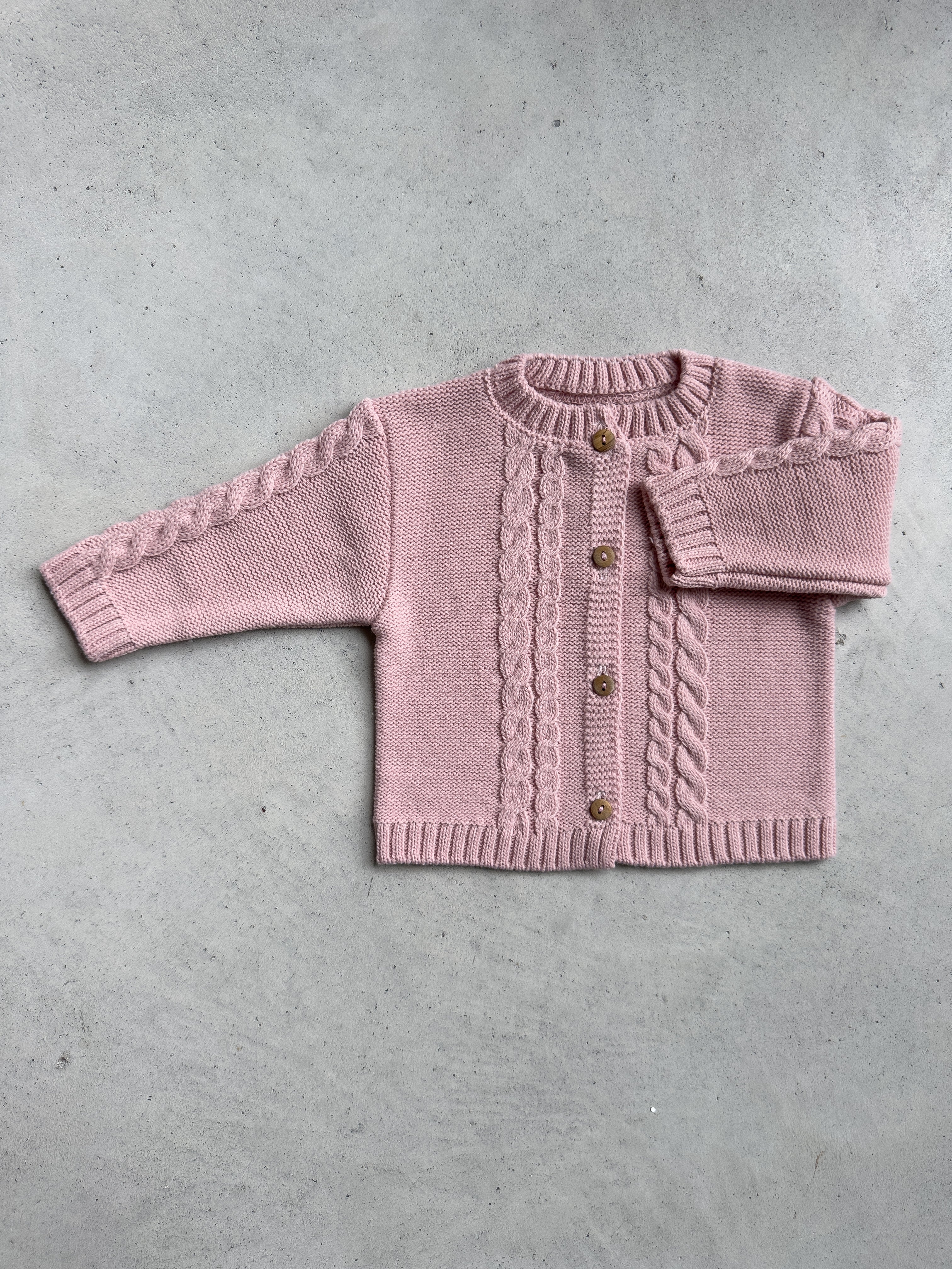 Baby breien vlechtjasje